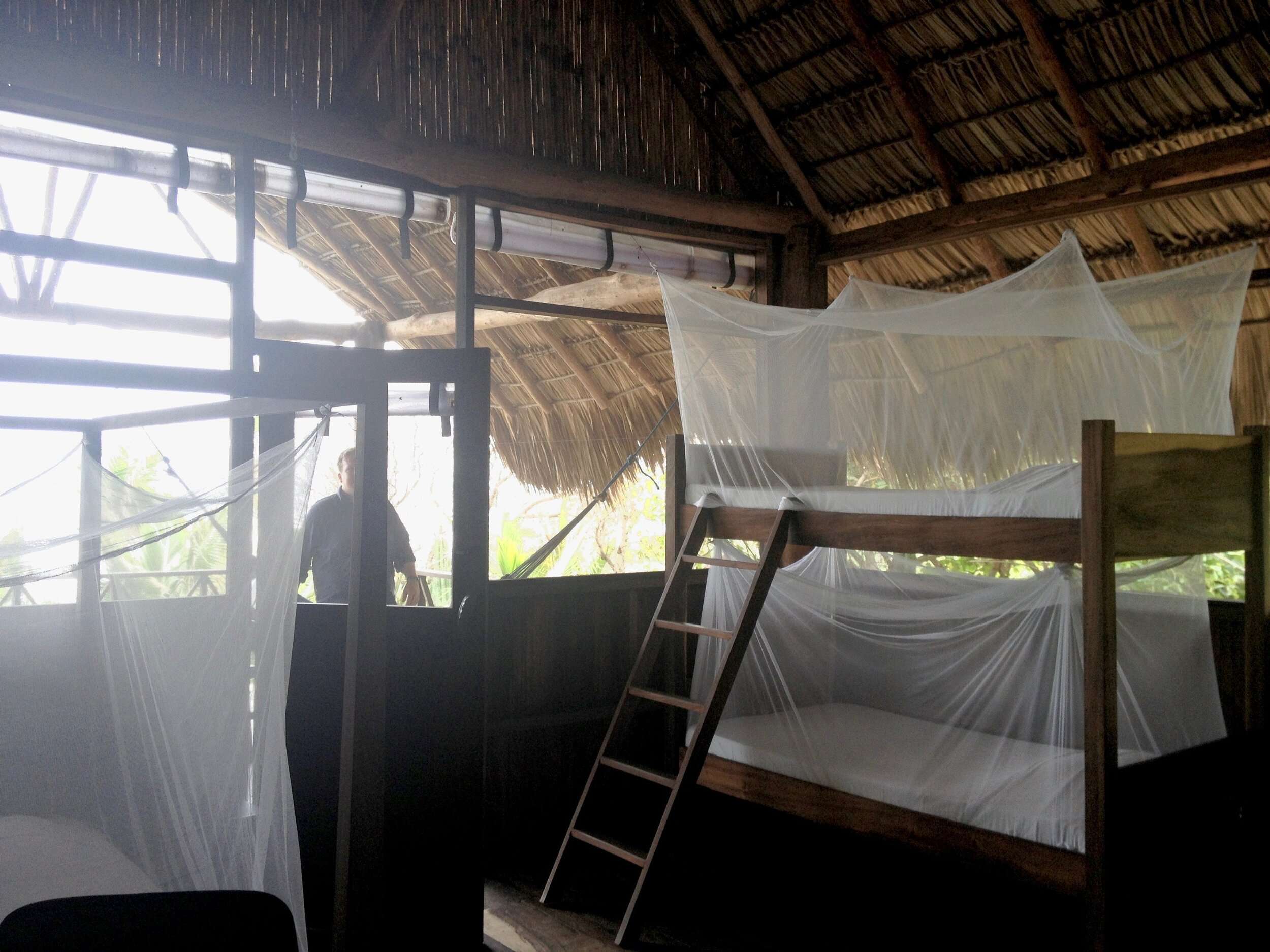 The Beds In Each Hut are Protected by Mosquito Netting
