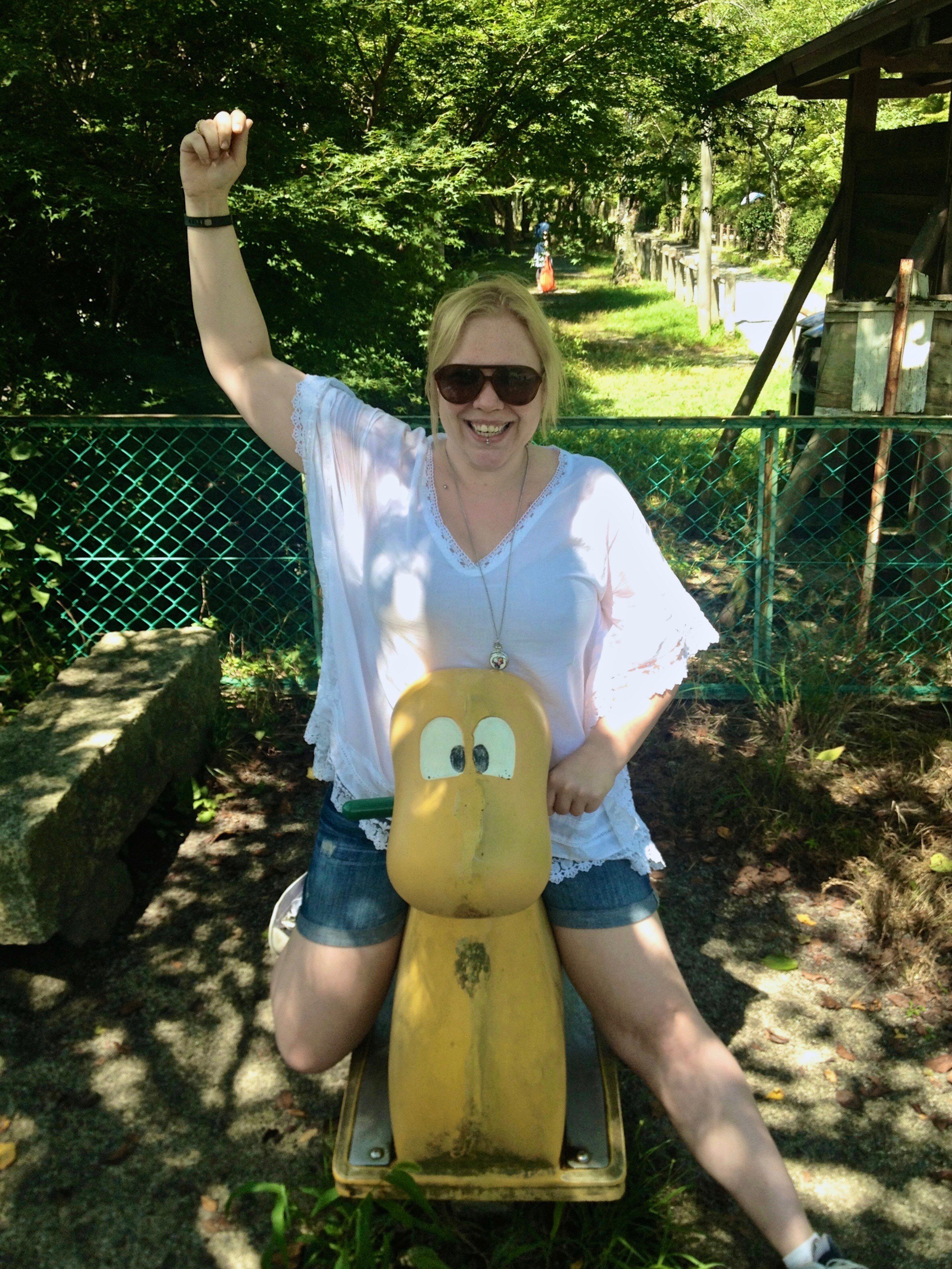 Me Riding a Playground Toy in Kyoto