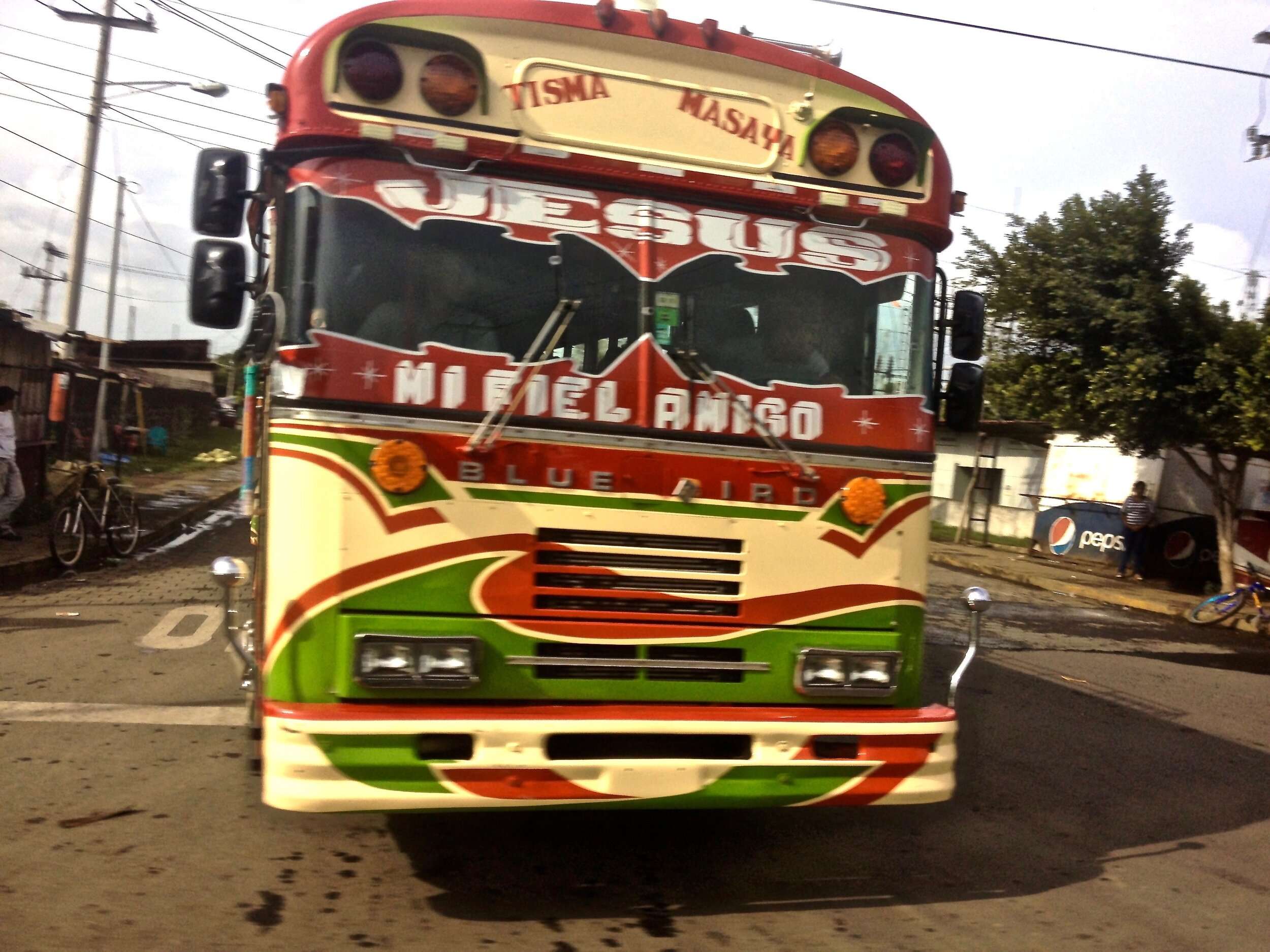 One of many brightly colored Nicaragua chicken busses.